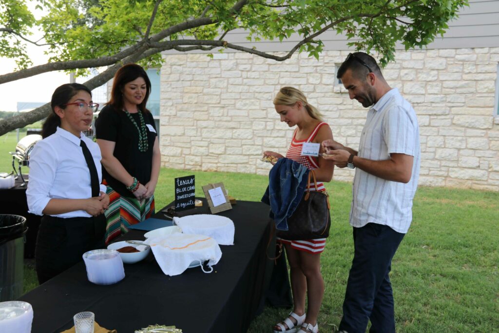 A woman farmer shares with Field to Fork guests about CommonGround.