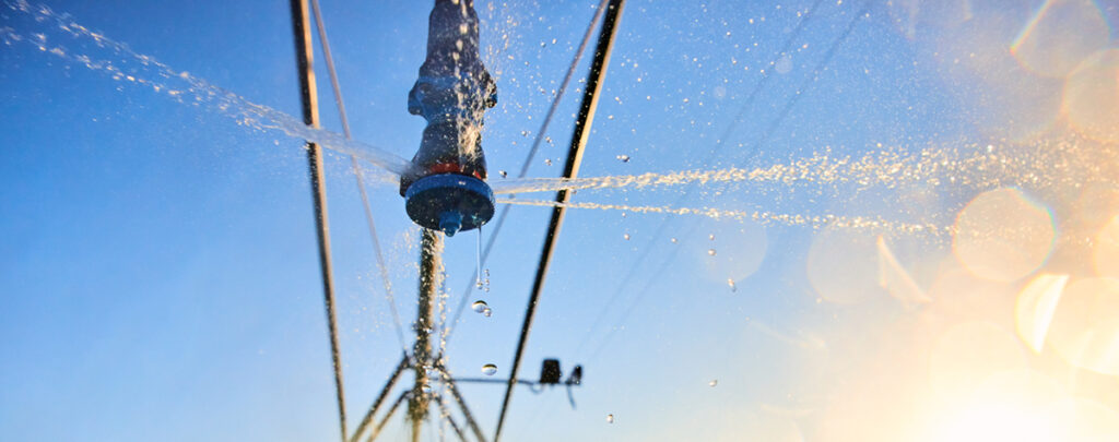 Irrigation pivot spraying water