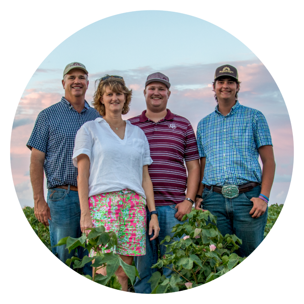 The Whatley family standing together.
