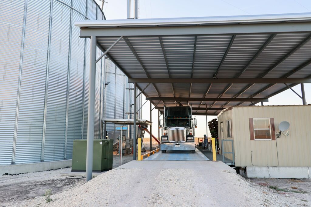 Semi bringing corn to a storage facility.